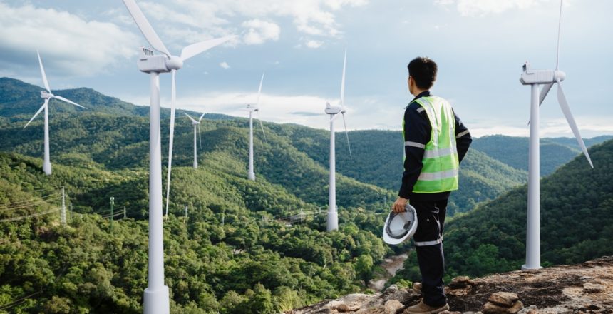 Young,Maintenance,Engineer,Man,Working,In,Wind,Turbine,On,The